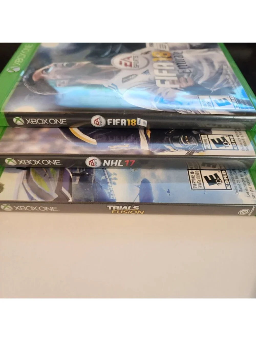 Xbox One 3 games bundle Trials Fusion FIFA 18 NHL 17 soccer hockey videogames